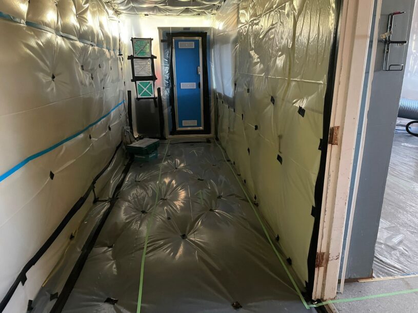 Interior view of Class A asbestos removal at a Northand school