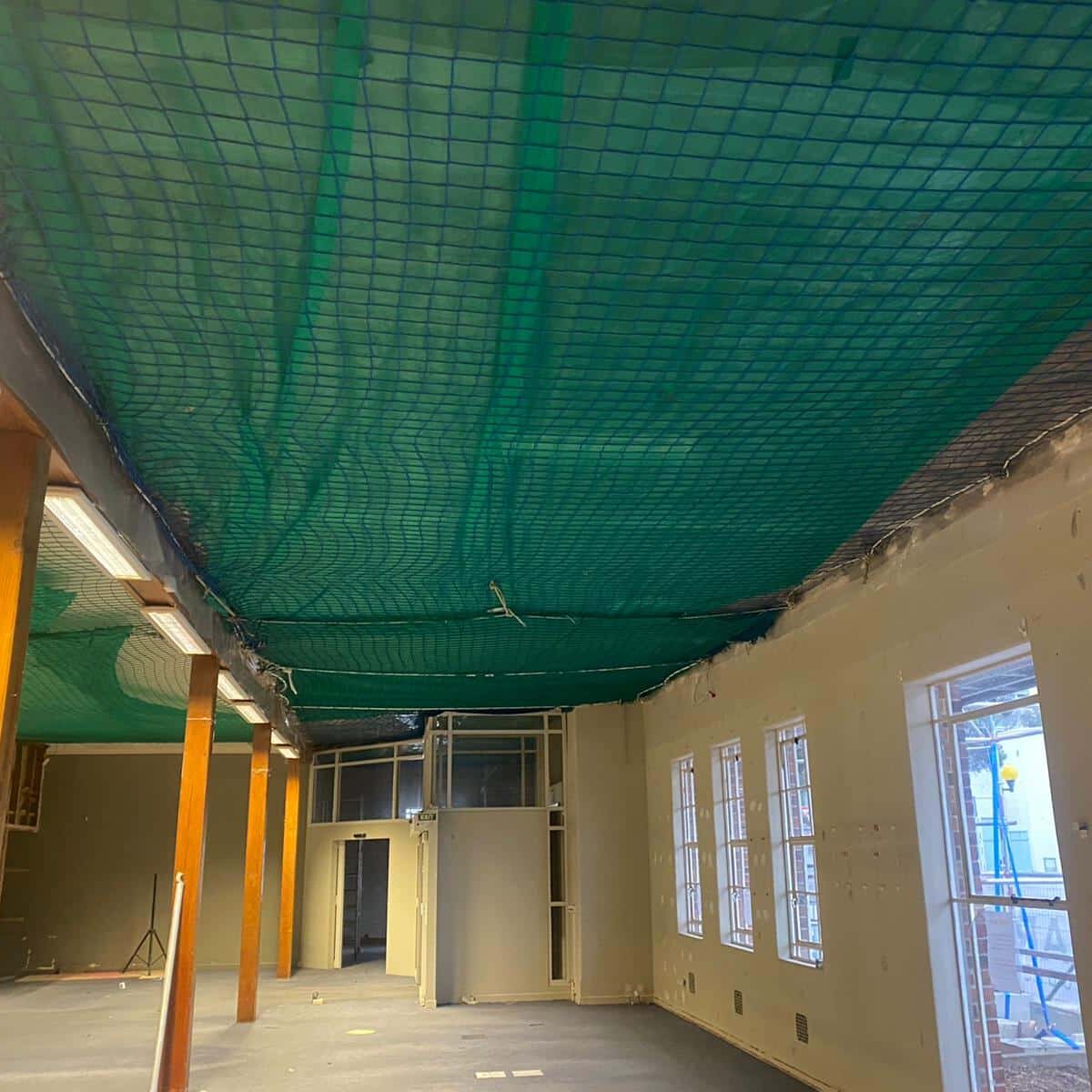 Full safety net installation Class B asbestos nroof removal