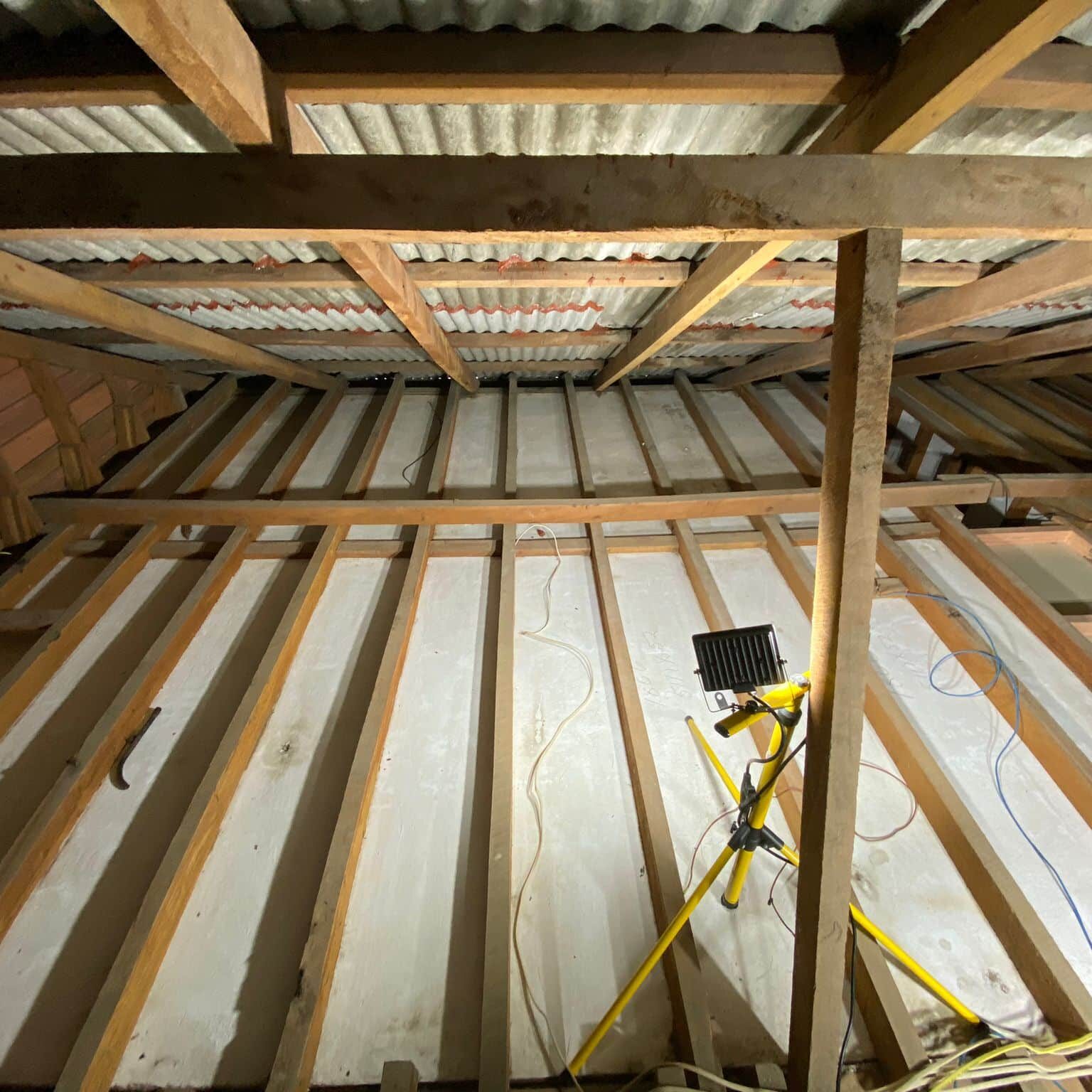 Inside view of the ceiling cavity in an asbestos roof.
