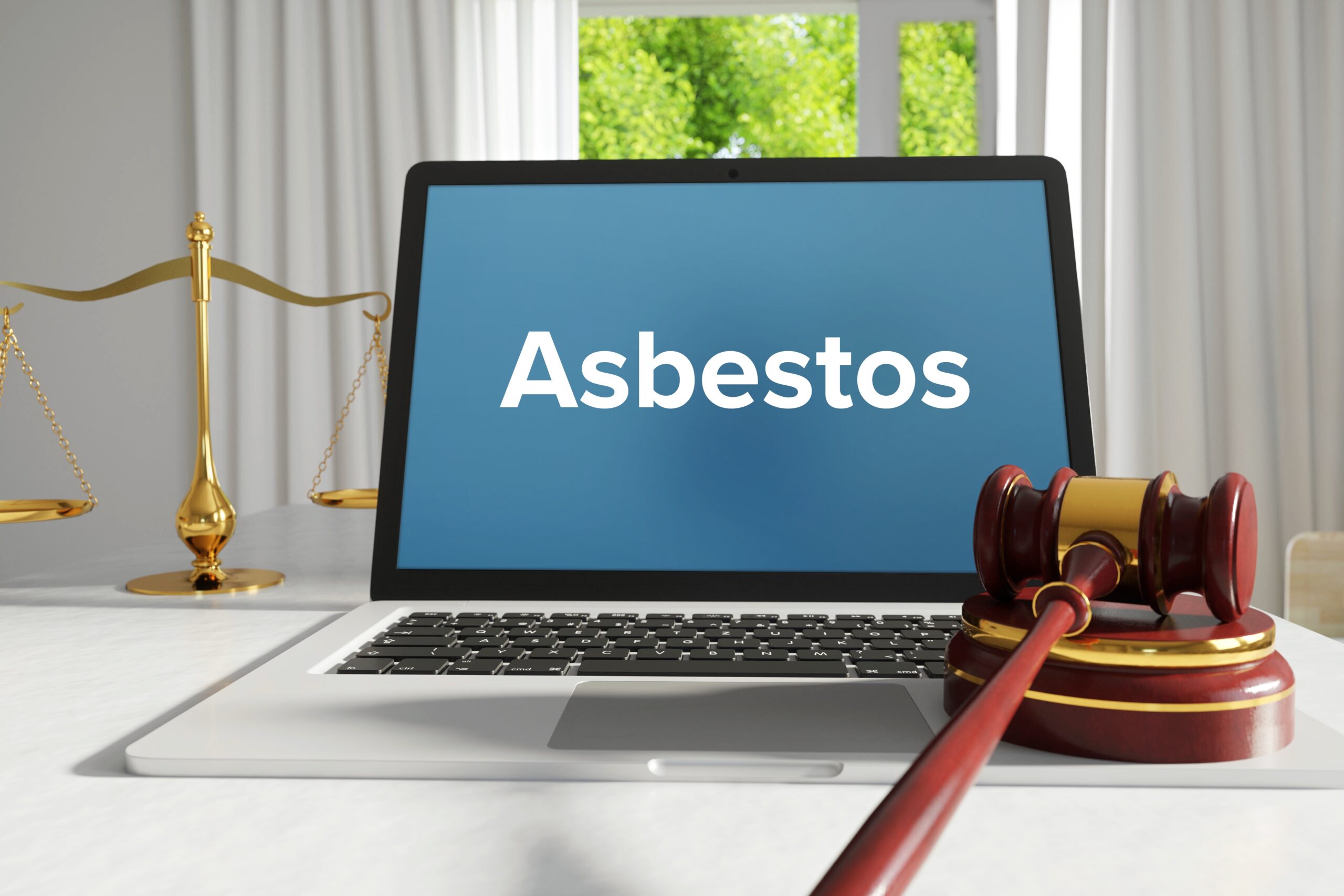 Asbestos – Law, Judgment, Web. Laptop in the office with term on the screen. Hammer, Libra, Lawyer.